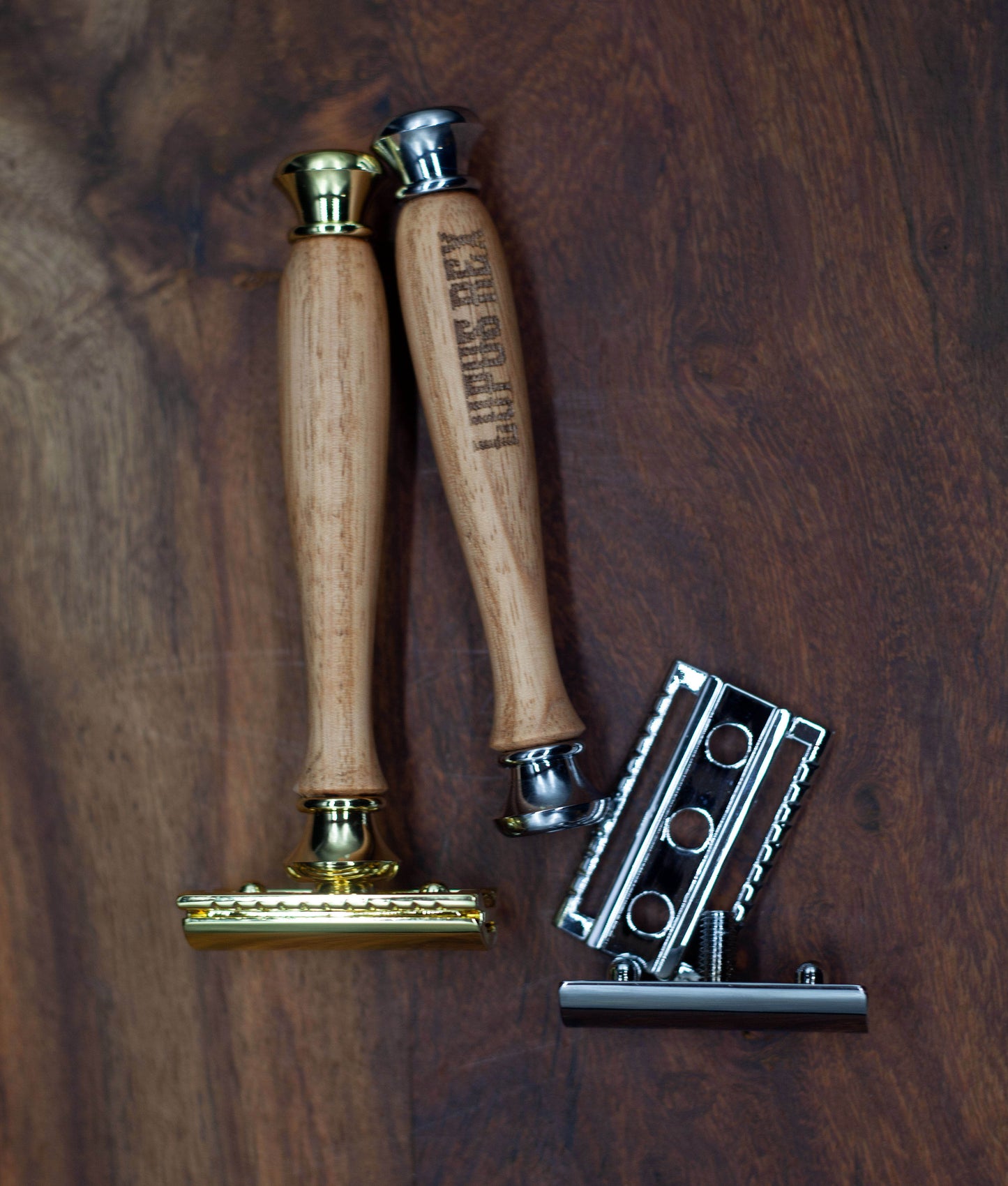 Australian handcrafted timber handled safety razor in gold or chrome coloured fittings with Lupus Rex branded on the handle