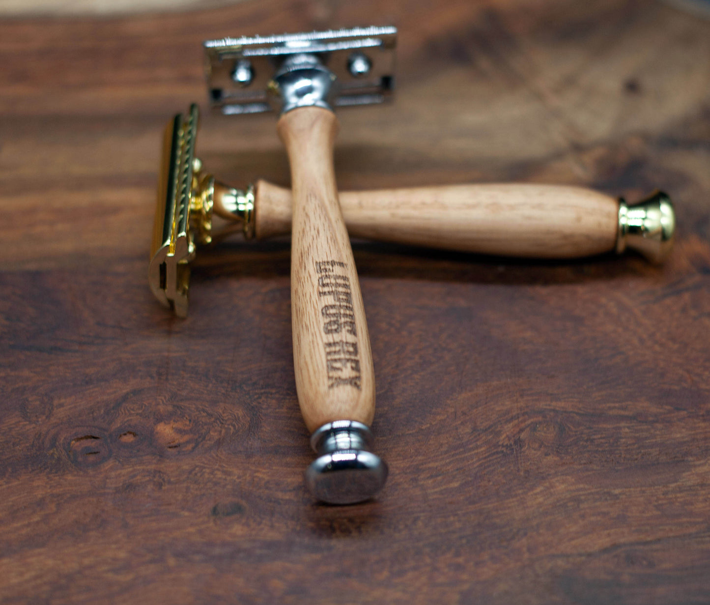 Australian handcrafted timber handled safety razor in gold or chrome coloured fittings with Lupus Rex branded on the handle
