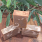 Australian handmade brown soap with white swirl from Lupus Rex shen soap featuring dead sea mud and shea butter