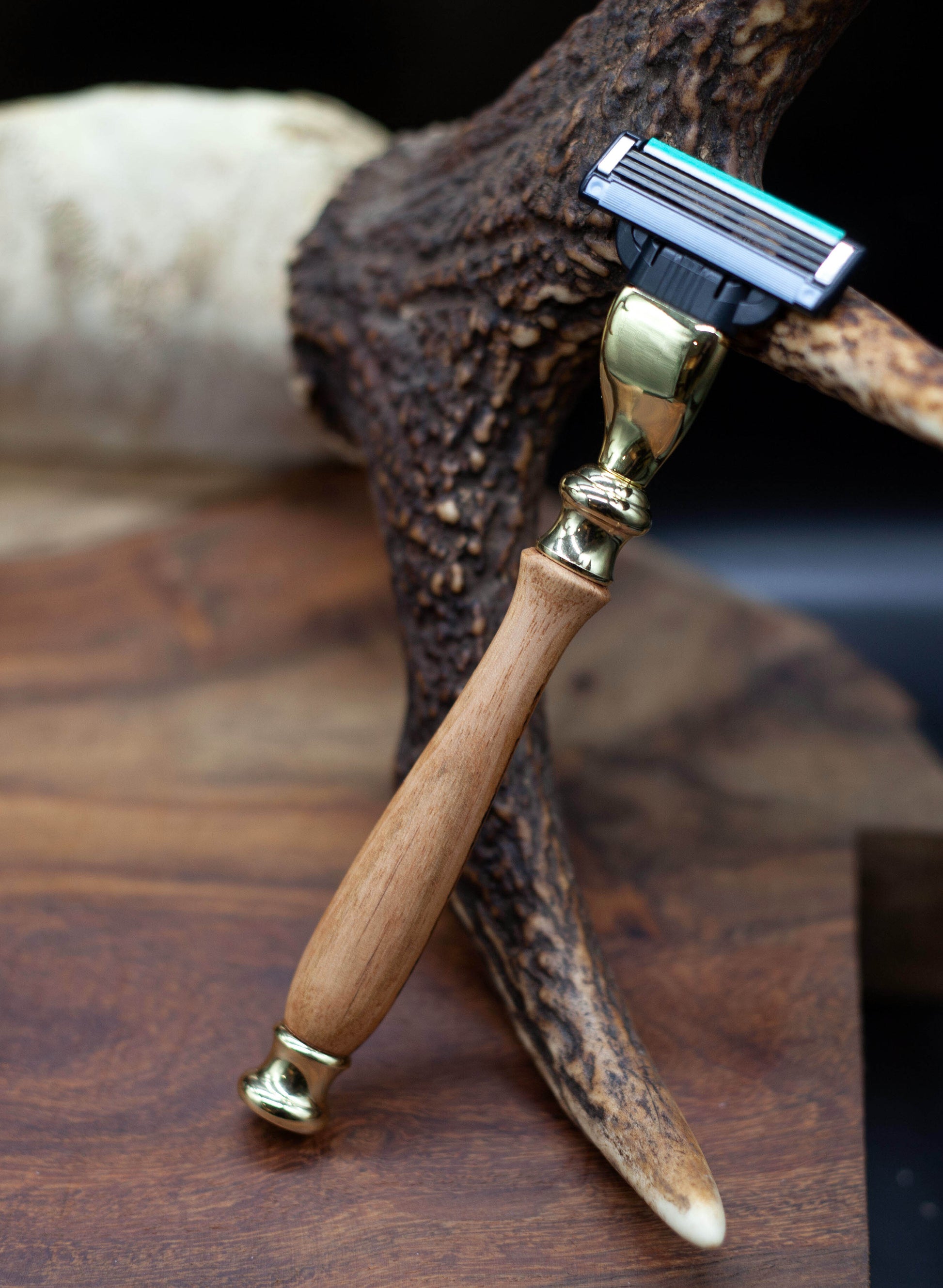 Australian handcrafted timber handle razors in either gold or chrome coloured fittings with changeable Gillette Mach III blade head