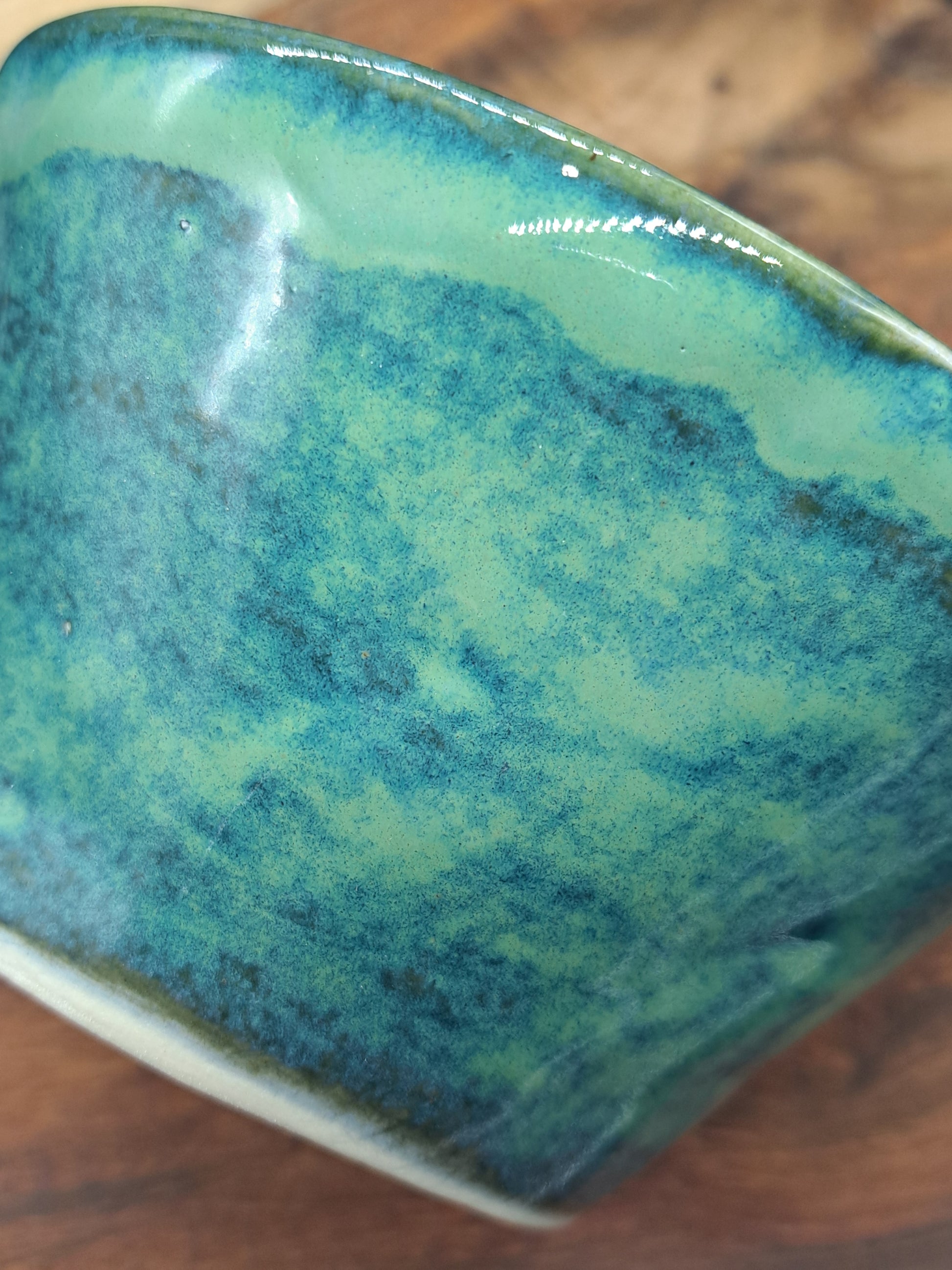 Australian handcrafted clay single wall shaving scuttles close up of the green slightly blue glaze