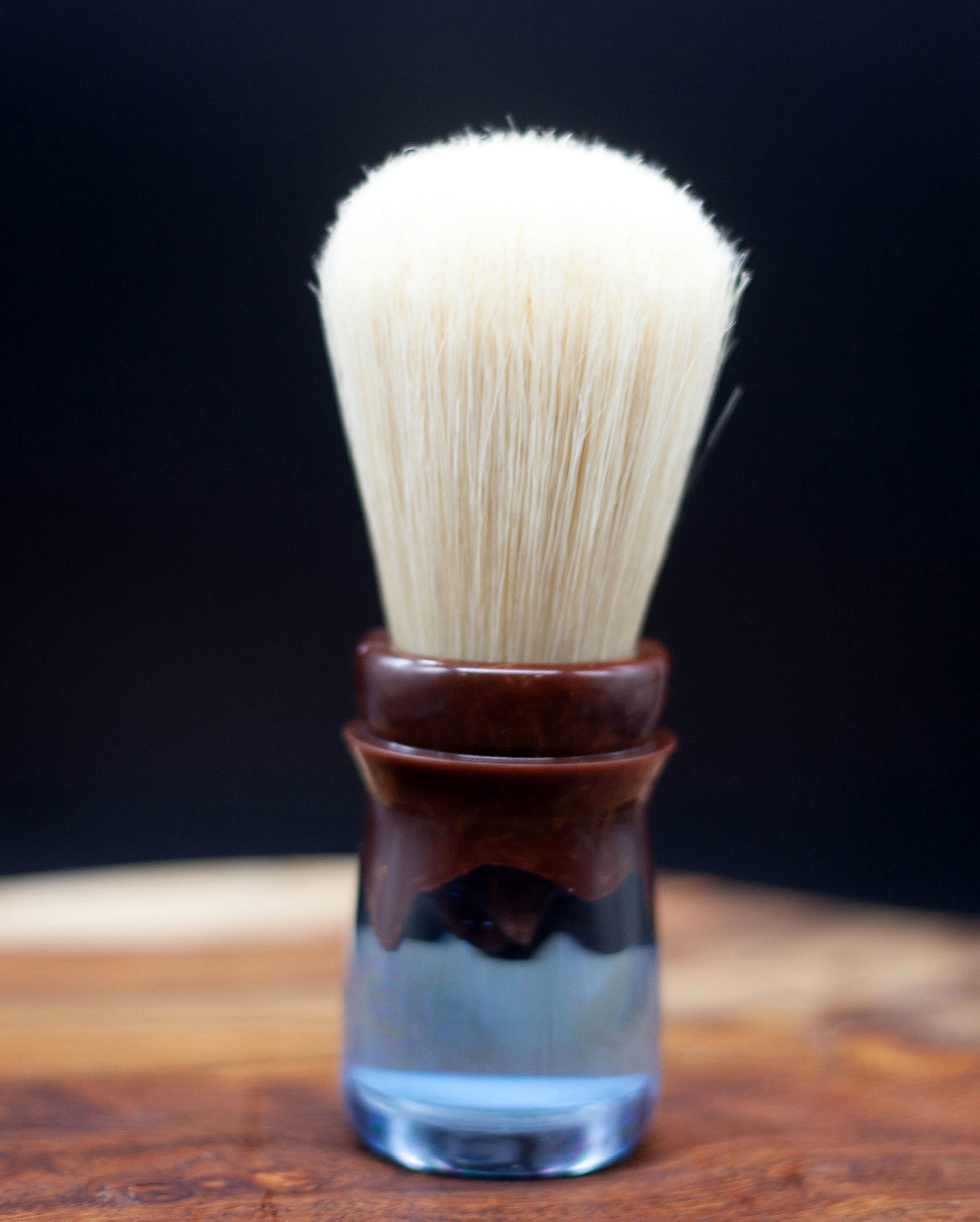Australian handcrafted from Lupus Rex shaving brush Razorback with a clear blue coloured resin with brown faux timber resin at top with boar hair knot