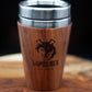 Australian handcrafted light to mid brown coloured timber exterior travel mug with stainless steel interior. Holds approx. 295ml or 10 oz which is roughly a small to medium at most cafes. Not dishwasher safe. Hand wash only. Don't immerse timber exterior in water. Lupus Rex logo with wolf head branded on  timber